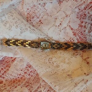 Silver tone Woman's wrist watch with marcasite Band